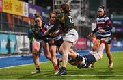 26 February 2022; Méabh Deely of Blackrock College is tackled by Railway Union players Nikki Caughey, left, and Eve Higgins during the Energia Women's All-Ireland League Final match between Blackrock College and Railway Union at Energia Park in Dublin. Photo by Ben McShane/Sportsfile