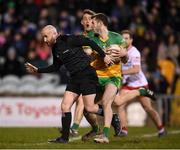 26 February 2022; Eoghan Ban Gallagher of Donegal clashes with referee Brendan Cawley during the Allianz Football League Division 1 match between Donegal and Tyrone at MacCumhaill Park in Ballybofey, Donegal. Photo by Stephen McCarthy/Sportsfile