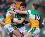 26 February 2022; Eoin Harkin of Meath in action against Jack Bryant, right, and Colm Doyle of Offaly during the Allianz Football League Division 2 match between Offaly and Meath at Bord na Mona O'Connor Park in Tullamore, Offaly. Photo by Michael P Ryan/Sportsfile