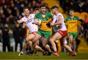 26 February 2022; Patrick McBrearty of Donegal in action against Richard Donnelly, right, and Kieran McGeary of Tyrone during the Allianz Football League Division 1 match between Donegal and Tyrone at MacCumhaill Park in Ballybofey, Donegal. Photo by Stephen McCarthy/Sportsfile
