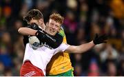 26 February 2022; Nathan Donnelly of Tyrone in action against Hugh McFadden of Donegal during the Allianz Football League Division 1 match between Donegal and Tyrone at MacCumhaill Park in Ballybofey, Donegal. Photo by Stephen McCarthy/Sportsfile