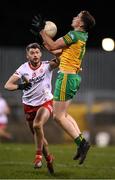 26 February 2022; Ciaran Thompson of Donegal in action against Richard Donnelly of Tyrone during the Allianz Football League Division 1 match between Donegal and Tyrone at MacCumhaill Park in Ballybofey, Donegal. Photo by Stephen McCarthy/Sportsfile
