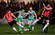 25 February 2022; Lee Grace of Shamrock Rovers in action against Joe Thomson, left, and Will Patching of Derry City during the SSE Airtricity League Premier Division match between Derry City and Shamrock Rovers at The Ryan McBride Brandywell Stadium in Derry. Photo by Stephen McCarthy/Sportsfile