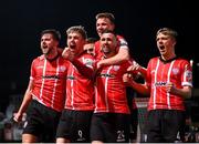 25 February 2022; Will Patching, left, celebrates with Derry City team-mates, from left, Jamie McGonigle, Brandon Kavanagh, Daniel Lafferty and Ciaron Harkin after scoring their side's first goal during the SSE Airtricity League Premier Division match between Derry City and Shamrock Rovers at The Ryan McBride Brandywell Stadium in Derry. Photo by Stephen McCarthy/Sportsfile