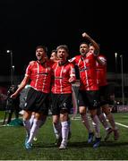 25 February 2022; Will Patching, left, celebrates with Derry City team-mates, from left, Jamie McGonigle, Daniel Lafferty and Brandon Kavanagh after scoring their side's first goal during the SSE Airtricity League Premier Division match between Derry City and Shamrock Rovers at The Ryan McBride Brandywell Stadium in Derry. Photo by Stephen McCarthy/Sportsfile