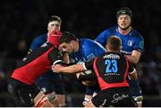 25 February 2022; Max Deegan of Leinster is tackled by Francke Horn and Tiaan Swanepoel of Emirates Lions during the United Rugby Championship match between Leinster and Emirates Lions at the RDS Arena in Dublin. Photo by Seb Daly/Sportsfile