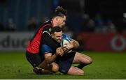 25 February 2022; Dave Kearney of Leinster is tackled by Quan Horn of Emirates Lions during the United Rugby Championship match between Leinster and Emirates Lions at the RDS Arena in Dublin. Photo by Seb Daly/Sportsfile
