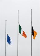 27 February 2022; The Tricolour, Kilkenny and Laois flags, fly at half mast to honour the late Kilkenny hurling star Johnny McGovern, who won five Leinster titles and two All-Ireland crowns during his time as a player, before the Allianz Hurling League Division 1 Group B match between Kilkenny and Laois at UPMC Nowlan Park in Kilkenny. Photo by Ray McManus/Sportsfile