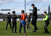 27 February 2022; Stefan Campbell of Armagh warms-up with young Armagh supporters before the Allianz Football League Division 1 match between Mayo and Armagh at Dr Hyde Park in Roscommon. Photo by Ramsey Cardy/Sportsfile