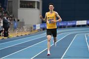 27 February 2022; Luke McCann of UCD AC, Dublin, celebrates winning the senior men's 1500m during day two of the Irish Life Health National Senior Indoor Athletics Championships at the National Indoor Arena at the Sport Ireland Campus in Dublin. Photo by Sam Barnes/Sportsfile