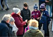 27 February 2022; Galway supporters Ryan O'Callaghan, aged 12, Neal O'Callaghan, aged 11, and Ronan Malone, aged 10, all from Oranmore Maree, review the official match programme before the Allianz Hurling League Division 1 Group A match between Galway and Wexford at Pearse Stadium in Galway. Photo by Diarmuid Greene/Sportsfile