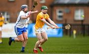 27 February 2022; Conal Cunning of Antrim in action against Neil Montgomery of Waterford during the Allianz Hurling League Division 1 Group B match between Antrim and Waterford at Corrigan Park in Belfast. Photo by Oliver McVeigh/Sportsfile