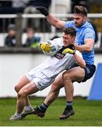 27 February 2022; Jimmy Hyland of Kildare is tackled by Seán McMahon of Dublin during the Allianz Football League Division 1 match between Kildare and Dublin at St Conleth's Park in Newbridge, Kildare. Photo by Piaras Ó Mídheach/Sportsfile