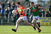 27 February 2022; Aidan Forker of Armagh in action against Aiden Orme of Mayo during the Allianz Football League Division 1 match between Mayo and Armagh at Dr Hyde Park in Roscommon. Photo by Ramsey Cardy/Sportsfile