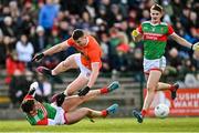 27 February 2022; Tiernan Kelly of Armagh in action against Jordan Flynn of Mayo during the Allianz Football League Division 1 match between Mayo and Armagh at Dr Hyde Park in Roscommon. Photo by Ramsey Cardy/Sportsfile