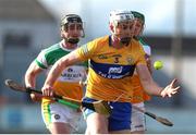 27 February 2022; Conor Cleary of Clare in action against Eoghan Parlon of Offaly during the Allianz Hurling League Division 1 Group A match between Offaly and Clare at Bord na Mona O'Connor Park in Tullamore, Offaly. Photo by Michael P Ryan/Sportsfile