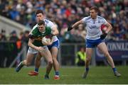 27 February 2022; Diarmuid O’Connor of Kerry in action against Shane Hanratty and Kieran Duffy, right, of Monaghan during the Allianz Football League Division 1 match between Monaghan and Kerry at Inniskeen Grattans GAA Club in Monaghan. Photo by Stephen McCarthy/Sportsfile
