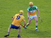 27 February 2022; Liam Langton of Offaly in action against Paddy Donnellan of Clare during the Allianz Hurling League Division 1 Group A match between Offaly and Clare at Bord na Mona O'Connor Park in Tullamore, Offaly. Photo by Michael P Ryan/Sportsfile