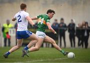 27 February 2022; David Clifford of Kerry shoots to score his side's second goal despite the attention of Kieran Duffy of Monaghan during the Allianz Football League Division 1 match between Monaghan and Kerry at Inniskeen Grattans GAA Club in Monaghan. Photo by Stephen McCarthy/Sportsfile