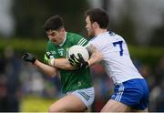 27 February 2022; Tony Brosnan of Kerry in action against Killian Lavelle of Monaghan during the Allianz Football League Division 1 match between Monaghan and Kerry at Inniskeen Grattans GAA Club in Monaghan. Photo by Stephen McCarthy/Sportsfile