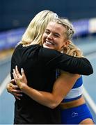 27 February 2022; Molly Scott of St Laurence O'Toole AC, Carlow, right, is congratulated by Olympian Derval O'Rourke after winning the senior women's 60m final in a national record time of 7.19, after the final had to be re-run during day two of the Irish Life Health National Senior Indoor Athletics Championships at the National Indoor Arena at the Sport Ireland Campus in Dublin. Photo by Sam Barnes/Sportsfile