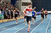 27 February 2022; Cillin Greene of Galway City Harriers AC, crosses the line to win the senior men's 400m during day two of the Irish Life Health National Senior Indoor Athletics Championships at the National Indoor Arena at the Sport Ireland Campus in Dublin. Photo by Sam Barnes/Sportsfile