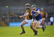 27 February 2022; James Bergin of Kilkenny is tackled by Seán Downey of Laois during the Allianz Hurling League Division 1 Group B match between Kilkenny and Laois at UPMC Nowlan Park in Kilkenny. Photo by Ray McManus/Sportsfile