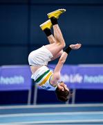27 February 2022; Matthew Rossiter of St Abbans AC, Laois, celebrates a clearance with a backflip whilst competing in the senior men's Pole Vault during day two of the Irish Life Health National Senior Indoor Athletics Championships at the National Indoor Arena at the Sport Ireland Campus in Dublin. Photo by Sam Barnes/Sportsfile