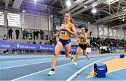 27 February 2022; Sarah Healy of UCD AC, Dublin, on her way to winning the senior women's 1500m, ahead of Michelle Finn of Leevale AC, Cork, who finished second, during day two of the Irish Life Health National Senior Indoor Athletics Championships at the National Indoor Arena at the Sport Ireland Campus in Dublin. Photo by Sam Barnes/Sportsfile
