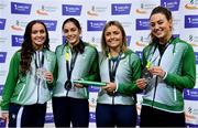 27 February 2022; The Ireland Women's 4x200m Relay team, from left, Aoife Lynch, Kate Doherty, Sarah Quinn and Sophie Becker, who won a silver medal at the World Athletics Relays, pictured with their medals during day two of the Irish Life Health National Senior Indoor Athletics Championships at the National Indoor Arena at the Sport Ireland Campus in Dublin. Photo by Sam Barnes/Sportsfile