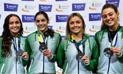 27 February 2022; The Ireland Women's 4x200m Relay team, from left, Aoife Lynch, Kate Doherty, Sarah Quinn and Sophie Becker, who won a silver medal at the World Athletics Relays, pictured with their medals during day two of the Irish Life Health National Senior Indoor Athletics Championships at the National Indoor Arena at the Sport Ireland Campus in Dublin. Photo by Sam Barnes/Sportsfile