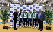 27 February 2022; Athletics Ireland President John Cronin, right, and Athletics Ireland Deputy President Brid Golden with The Ireland Women's 4x200m Relay team, from left, Aoife Lynch, Kate Doherty, Sarah Quinn and Sophie Becker, who won a silver medal at the World Athletics Relays, pictured during day two of the Irish Life Health National Senior Indoor Athletics Championships at the National Indoor Arena at the Sport Ireland Campus in Dublin. Photo by Sam Barnes/Sportsfile