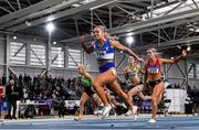 27 February 2022; Molly Scott of St Laurence O'Toole AC, Carlow, crosses the line to win the senior women's 60m during day two of the Irish Life Health National Senior Indoor Athletics Championships at the National Indoor Arena at the Sport Ireland Campus in Dublin. Photo by Sam Barnes/Sportsfile