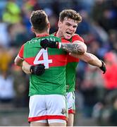 27 February 2022; Jordan Flynn, right, and Michael Plunkett of Mayo celebrate after the Allianz Football League Division 1 match between Mayo and Armagh at Dr Hyde Park in Roscommon. Photo by Ramsey Cardy/Sportsfile