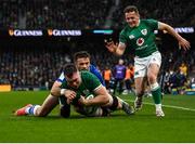 27 February 2022; Peter O’Mahony of Ireland on his way to scoring his side's fourth try despite the tackle of Edoardo Padovani of Italy during the Guinness Six Nations Rugby Championship match between Ireland and Italy at the Aviva Stadium in Dublin. Photo by Harry Murphy/Sportsfile