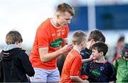 27 February 2022; Rian O'Neill of Armagh with supporters after the Allianz Football League Division 1 match between Mayo and Armagh at Dr Hyde Park in Roscommon. Photo by Ramsey Cardy/Sportsfile
