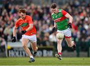 27 February 2022; Matthew Ruane of Mayo in action against Jason Duffy of Armagh during the Allianz Football League Division 1 match between Mayo and Armagh at Dr Hyde Park in Roscommon. Photo by Ramsey Cardy/Sportsfile