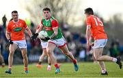 27 February 2022; Jordan Flynn of Mayo in action against Stephen Sheridan, left, and Aidan Nugent of Armagh during the Allianz Football League Division 1 match between Mayo and Armagh at Dr Hyde Park in Roscommon. Photo by Ramsey Cardy/Sportsfile