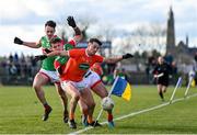 27 February 2022; Connaire Mackin of Armagh in action against Jordan Flynn of Mayo during the Allianz Football League Division 1 match between Mayo and Armagh at Dr Hyde Park in Roscommon. Photo by Ramsey Cardy/Sportsfile