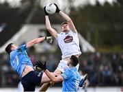 27 February 2022; Kevin Feely of Kildare wins possession ahead of Dublin players Tom Lahiff, left, and Brian Fenton during the Allianz Football League Division 1 match between Kildare and Dublin at St Conleth's Park in Newbridge, Kildare. Photo by Piaras Ó Mídheach/Sportsfile