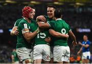 27 February 2022; Michael Lowry of Ireland is congratulated by team mates, from left, Josh van der Flier, Robbie Henshaw, James Hume and Jamison Gibson-Park after he scored their side's sixth try during the Guinness Six Nations Rugby Championship match between Ireland and Italy at the Aviva Stadium in Dublin. Photo by David Fitzgerald/Sportsfile