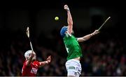 27 February 2022; Aaron Costelloe of Limerick in action against Patrick Horgan of Cork during the Allianz Hurling League Division 1 Group A match between Limerick and Cork at TUS Gaelic Grounds in Limerick. Photo by Eóin Noonan/Sportsfile