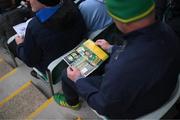 27 February 2022; A Kerry supporter reads the match programme before the Allianz Football League Division 1 match between Monaghan and Kerry at Inniskeen Grattans GAA Club in Monaghan. Photo by Stephen McCarthy/Sportsfile
