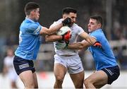27 February 2022; Ryan Houlihan of Kildare is tackled by Dublin players Ross McGarry, left, and Brian Howard during the Allianz Football League Division 1 match between Kildare and Dublin at St Conleth's Park in Newbridge, Kildare. Photo by Piaras Ó Mídheach/Sportsfile
