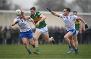 27 February 2022; Diarmuid O’Connor of Kerry in action against Darren Hughes, left, and Niall Kearns of Monaghan during the Allianz Football League Division 1 match between Monaghan and Kerry at Inniskeen Grattans GAA Club in Monaghan. Photo by Stephen McCarthy/Sportsfile