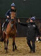 28 February 2022; Trainer Gordon Elliott, with Galvin, and Carly Scott, at his yard in Longwood, Co. Meath. Photo by Ramsey Cardy/Sportsfile