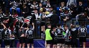 28 February 2022; Cistercian College players celebrate with their supporters after the Bank of Ireland Leinster Rugby Schools Junior Cup 1st Round match between Newbridge College, Kildare, and Cistercian College, Roscrea, Tipperary, at Energia Park in Dublin. Photo by Brendan Moran/Sportsfile
