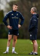 28 February 2022; Sam Prendergast speaks with Senior coach Stuart Lancaster during Leinster Rugby squad training at UCD in Dublin. Photo by Harry Murphy/Sportsfile