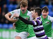 28 February 2022; Charlie Kennedy of Gonzaga College is tackled by Jack Cooney of Terenure College during the Bank of Ireland Leinster Rugby Schools Junior Cup 1st Round match between Terenure College, Dublin, and Gonzaga College, Dublin, at Energia Park in Dublin. Photo by Brendan Moran/Sportsfile