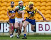 27 February 2022; Paddy Donnellan of Clare in action against Eimhin Kelly of Offaly during the Allianz Hurling League Division 1 Group A match between Offaly and Clare at Bord na Mona O'Connor Park in Tullamore, Offaly. Photo by Michael P Ryan/Sportsfile